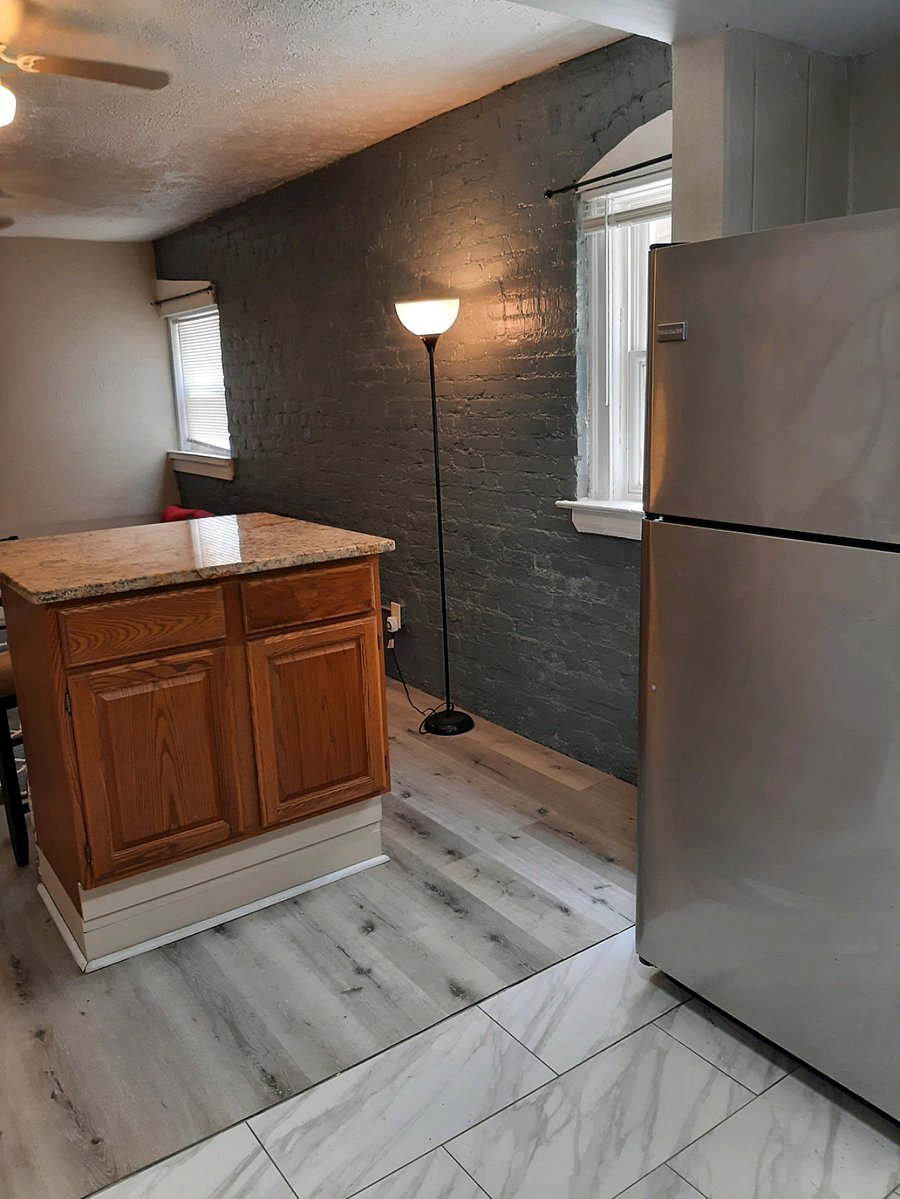 Open kitchen/living room with island (seats)
