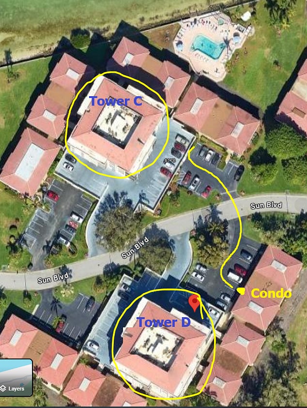 Aerial view of the condo location, just steps away from the pool and Boca Ciega Bay