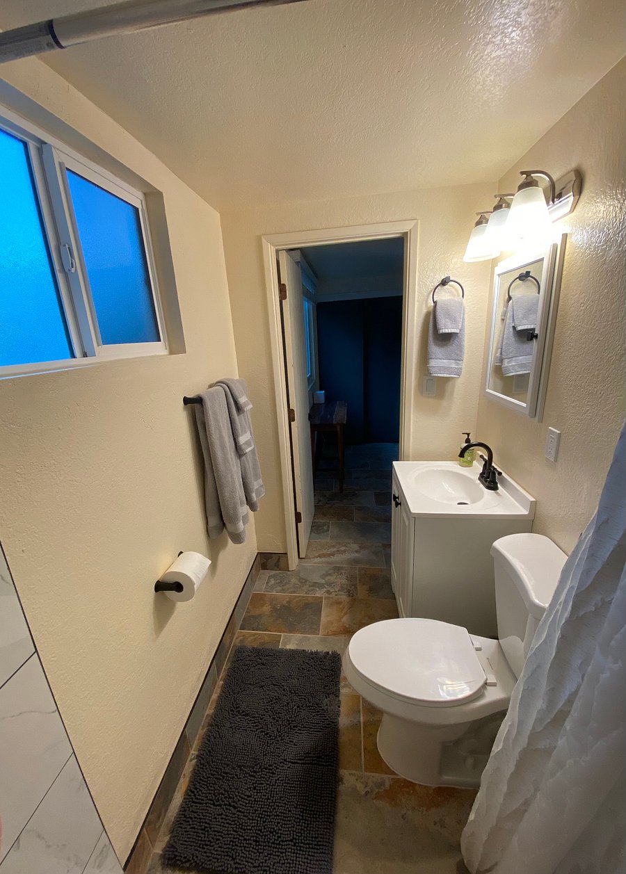 Bathroom looking out into common room