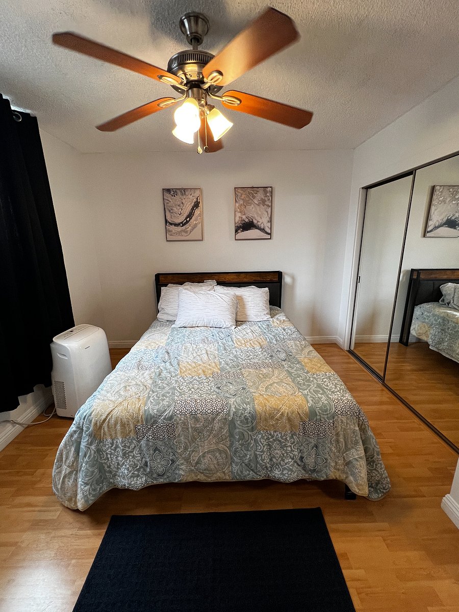 additional A/C unit in bedroom, room darkening shades, full mirror on closet