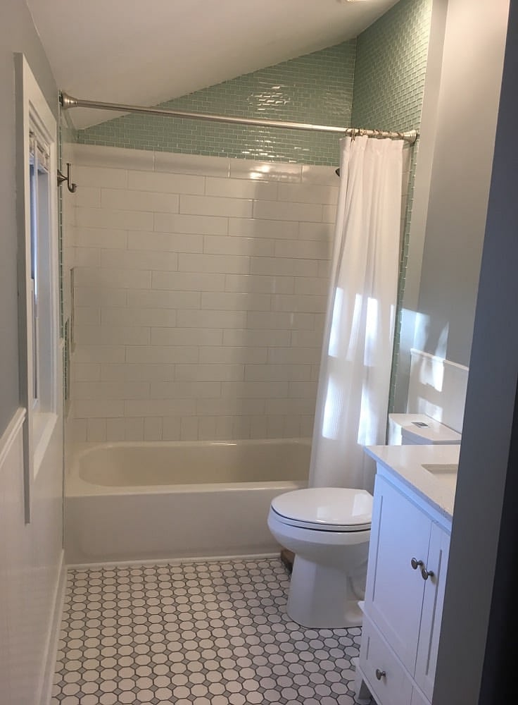 Newly remodeled full bathroom with in-floor radiant heat, programmable digital thermostat, quiet fan, nightlight, all-new fixtures.