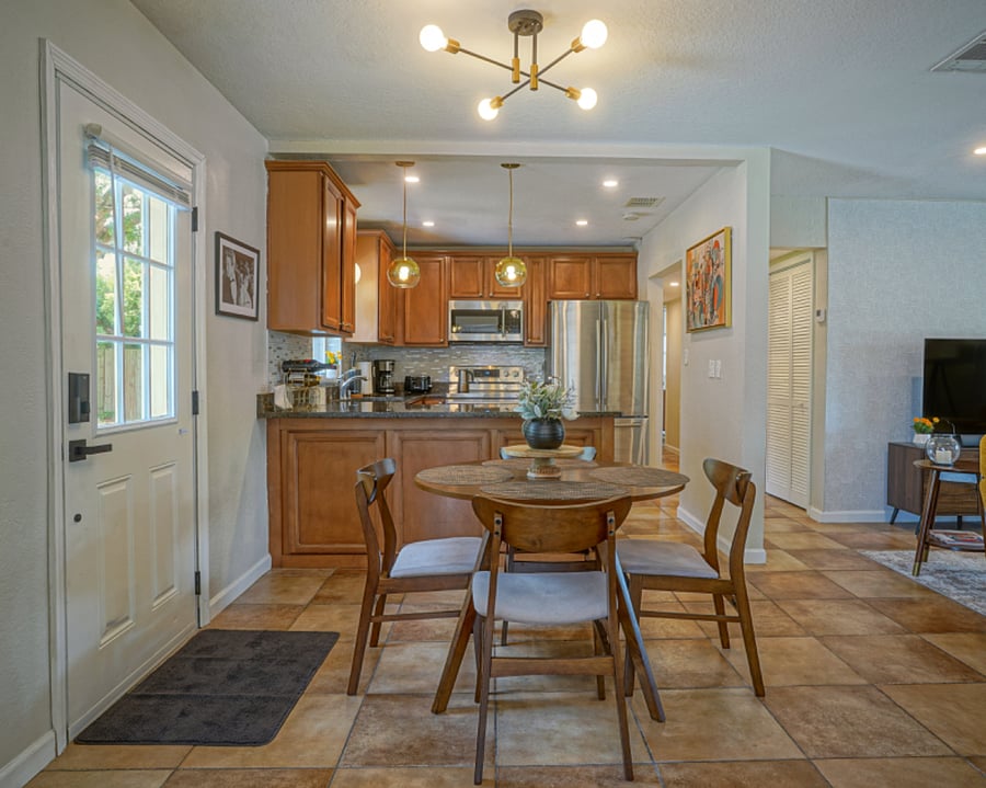 Cook up delicious meals in the open-plan, modern kitchen with granite countertops and top-of-the-line amenities.