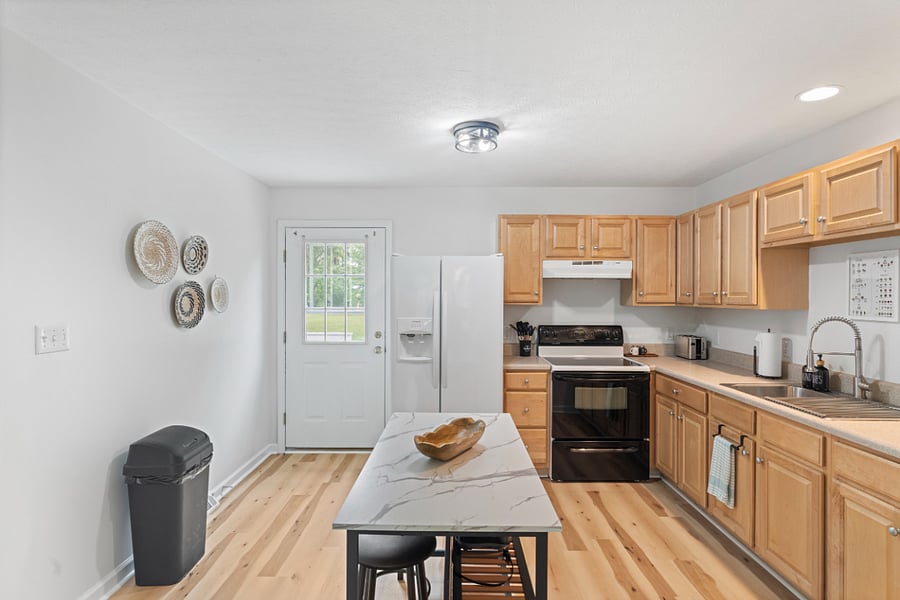 Full kitchen with loads of cabinet space! Please note: No dishwasher in these units.