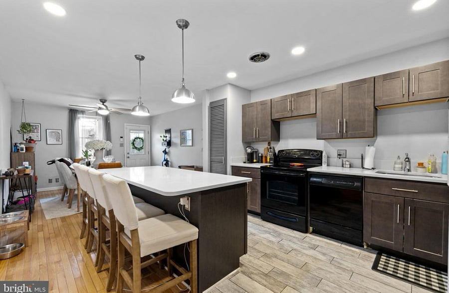 Kitchen and Dining Area, Back Door to Yard and Parking Pad