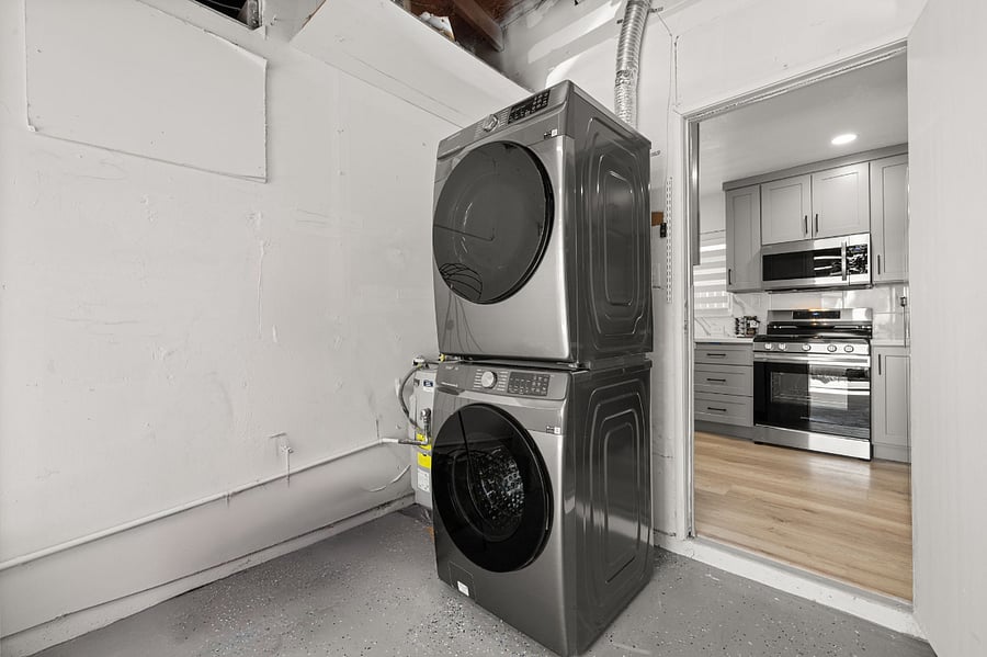 Samsung washer and dryer in garage.