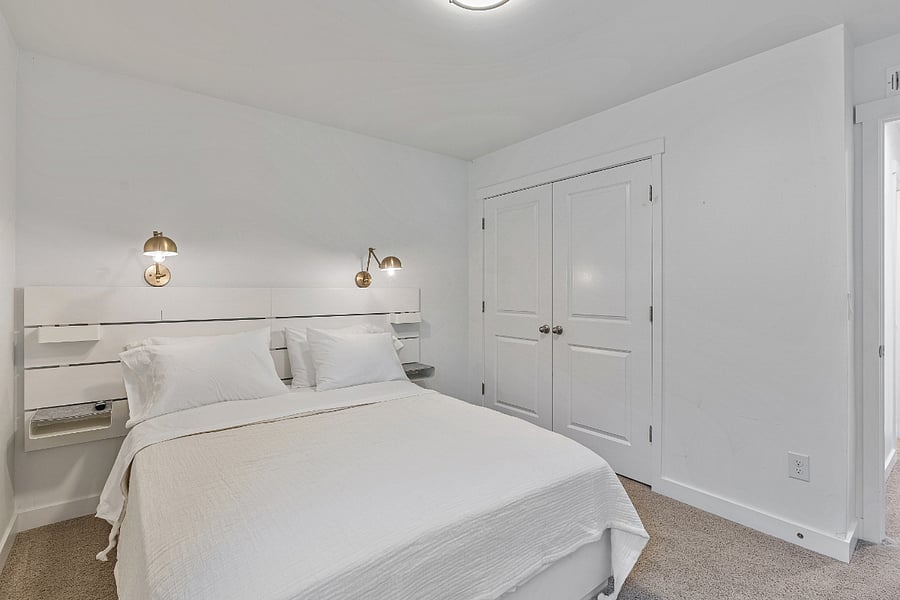 Bedroom #3 - Sconces, wall-mounted nightstands, and large closet. 