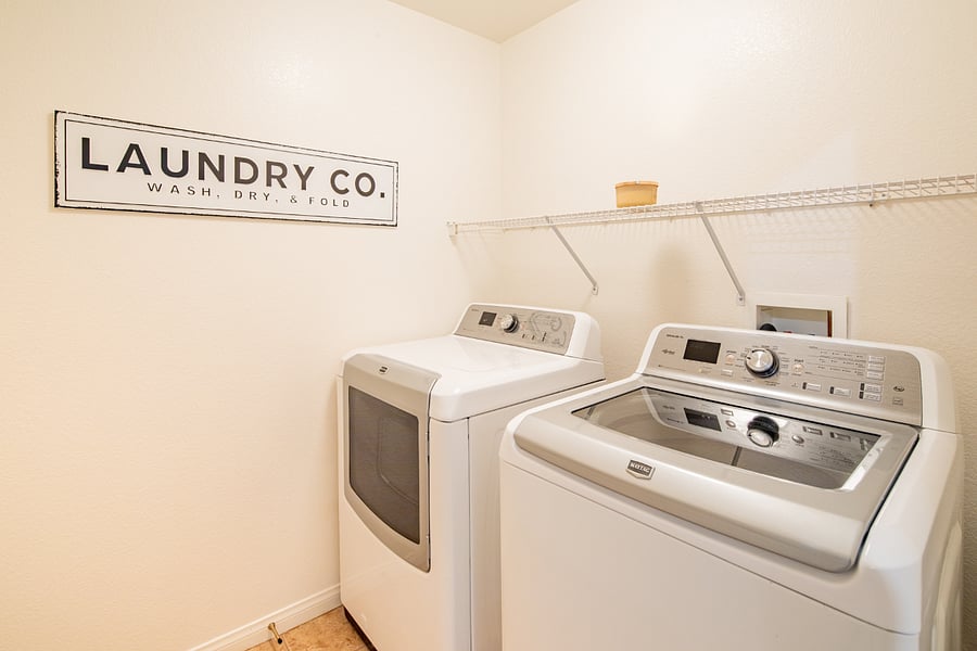 Laundry room with full size washer and dryer