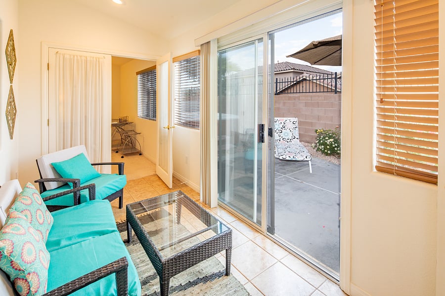 You can access this sitting area  from the primary bedroom or th dining room 