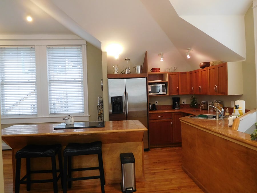 Open plan kitchen with large windows