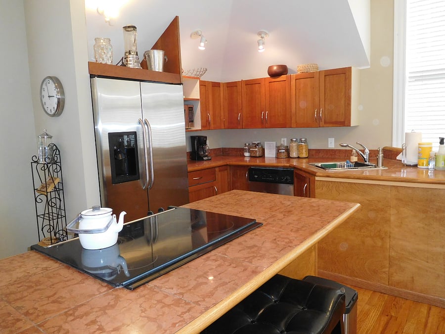 Large island with bar seating, open to living area