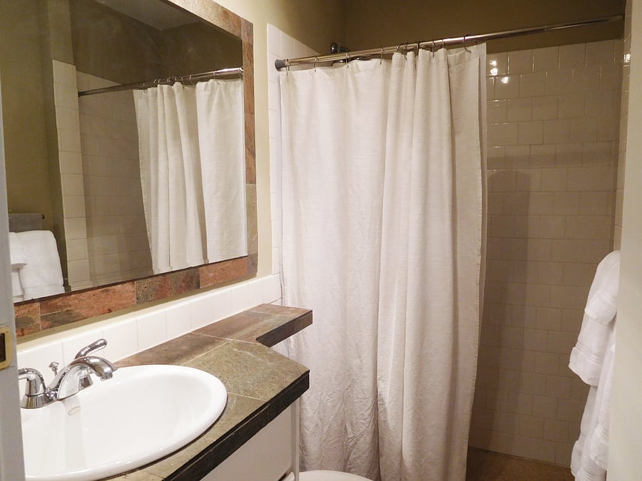 Large walk-in shower with shower stool