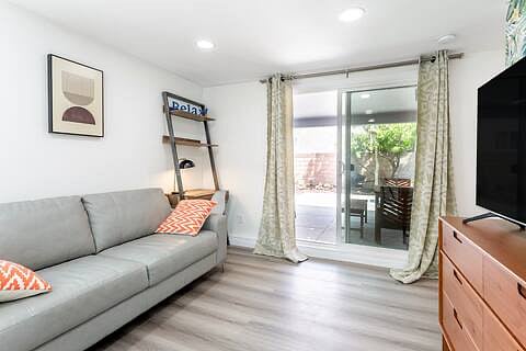 Modern genuine leather sofa, brand new solid wood queen size bed with canopy curtains,  writing desk with book case and task light. Other than bright recessed lights, there are 2 soft ambience lights with cute end tables that fits perfectly. 