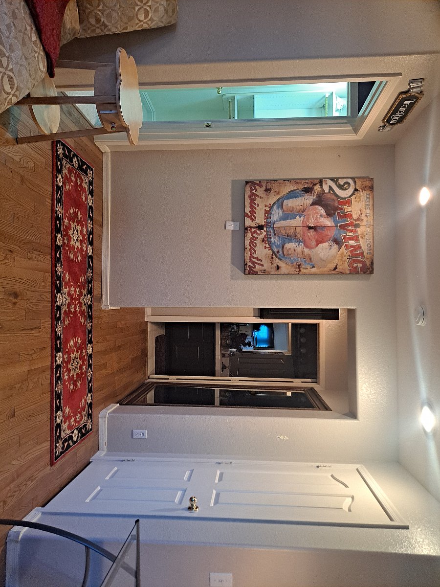 View from your Livingroom to your Bathroom straight ahead. Door to left is your Bedroom, and the door to your right leaves your suite.