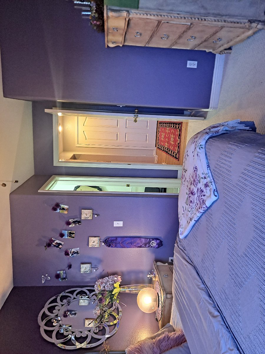 View from your bedroom out to your Livingroom to the right and your Bathroom to the left.
