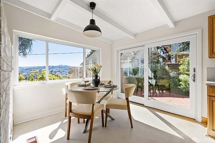 Eat-in kitchen with direct access to the shared garden and views of San Francisco