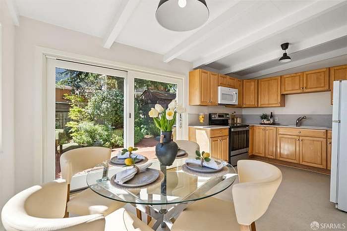 Eat-in kitchen with direct access to the shared garden and views of San Francisco