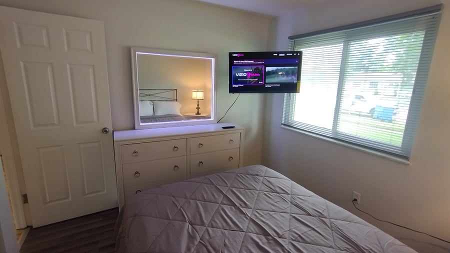 Bedroom with LED mirror