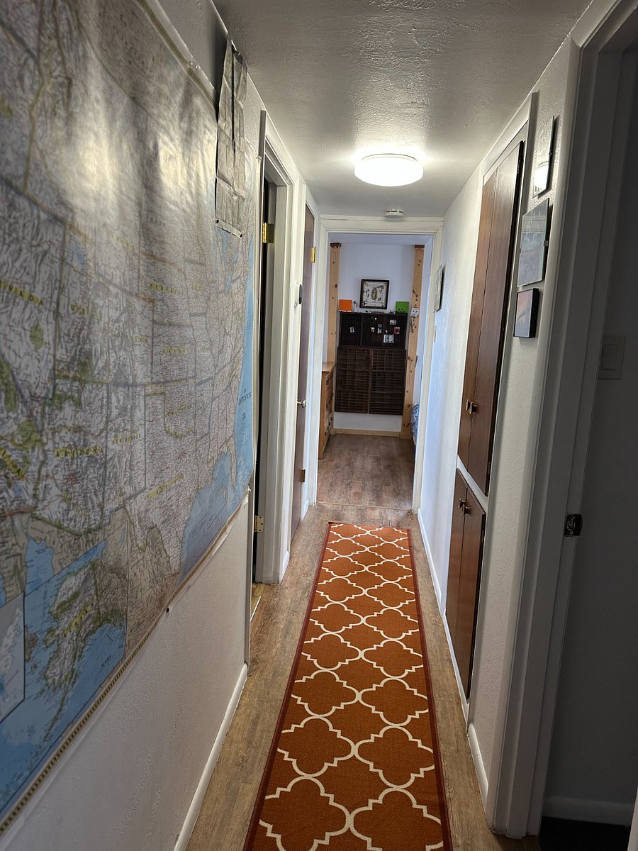 Hallway to bedrooms and bath.