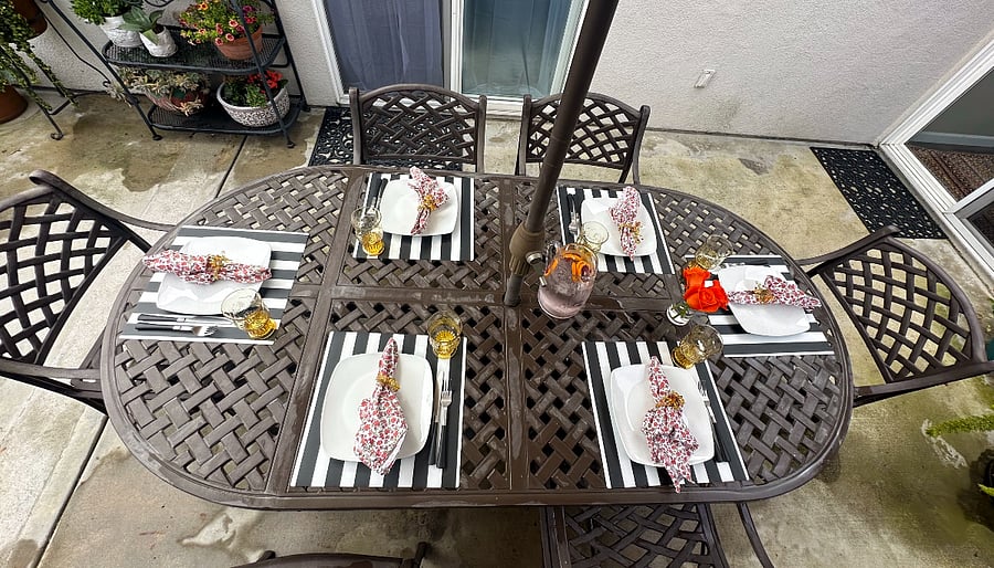 Outdoor dining table with sun umbrella