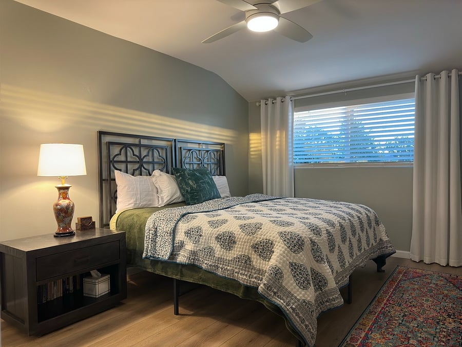 In this photo, the twins beds in the front bedroom have been converted into a king size bed.