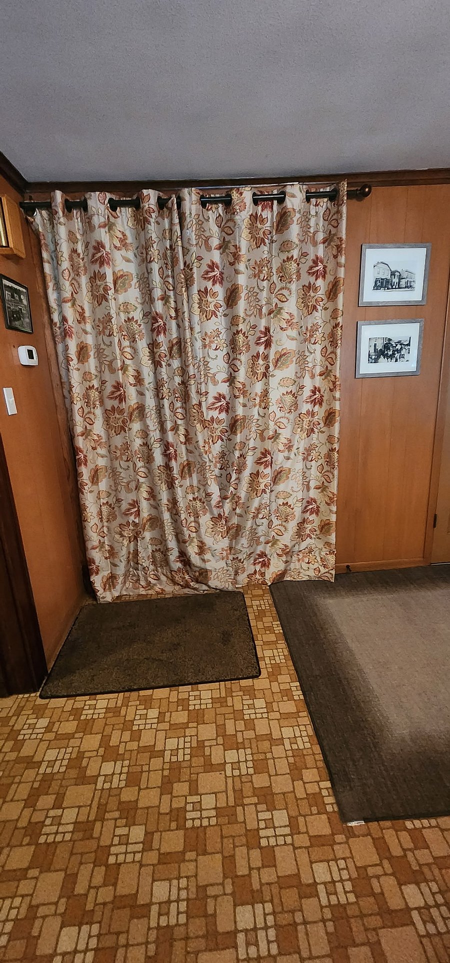 Dining room looking at stairs, behind curtains
