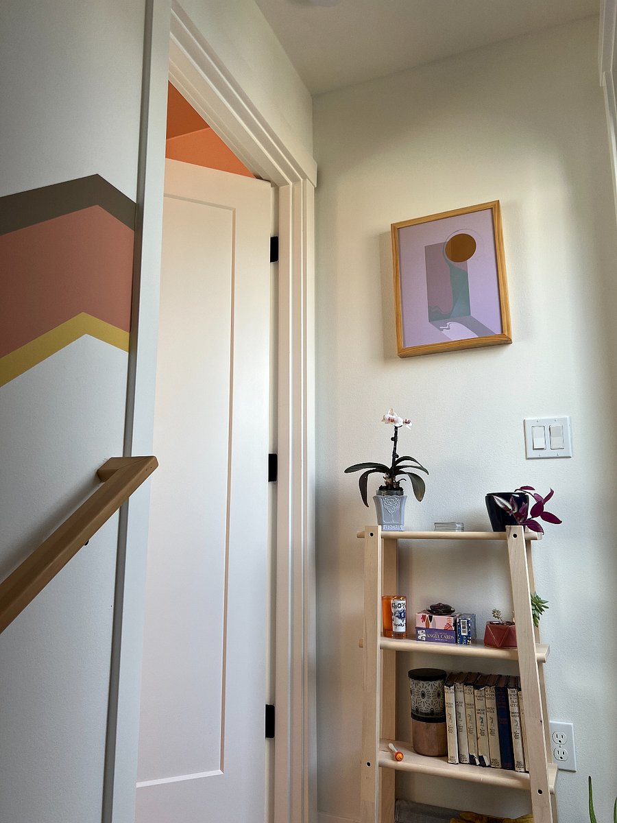 Stairway up to the primary bedroom