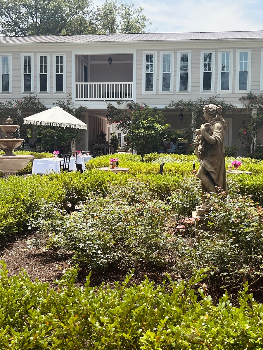 Backyard Garden, unit overlooks the garden from the enclosed and open air porch. 