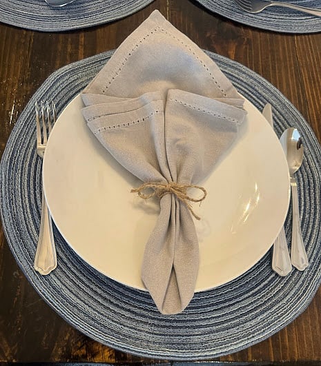 Plenty of silverware, plates, bowls, cups and glassware to gather around the table to share meals, memories and stories.