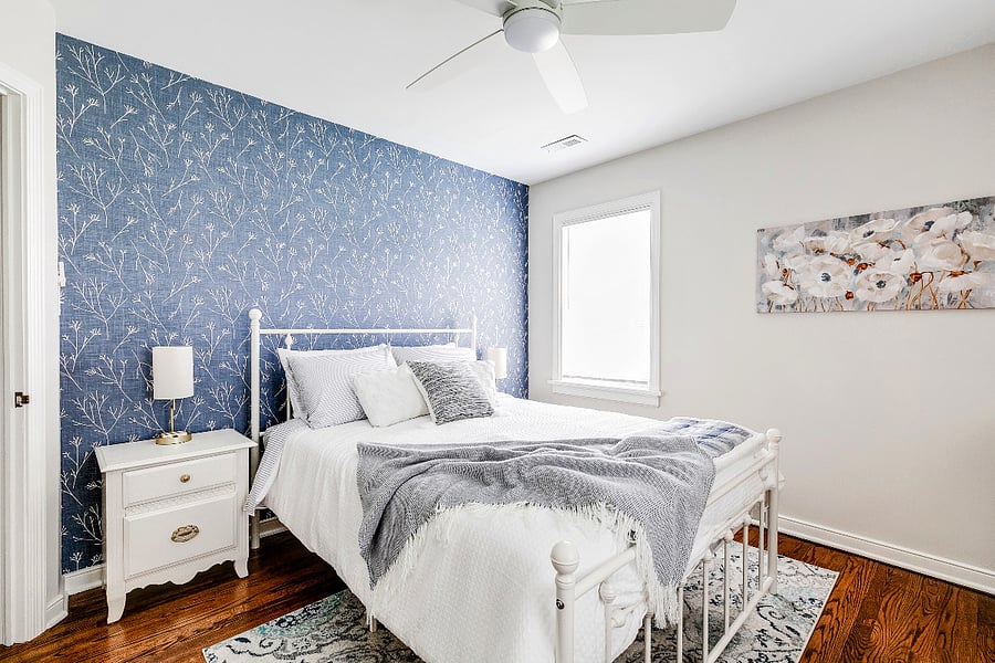 The 2nd bedroom has a queen size bed with lovely bedding along with choices of firmness with the pillows. The bedside lamps have plug-ins and holders for your phones. The dresser will hold your folded clothes and there's a closet to hold your hanging clothes and shoes.