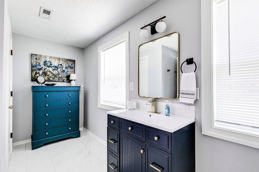 The attached master bathroom has a large dresser with easy to pull out drawers. There are also 2 large closets for linens, clothes and storage.