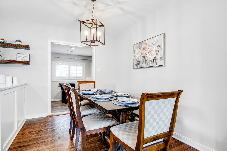 Enjoy family meals around the custom-made farm table with penty of seating!