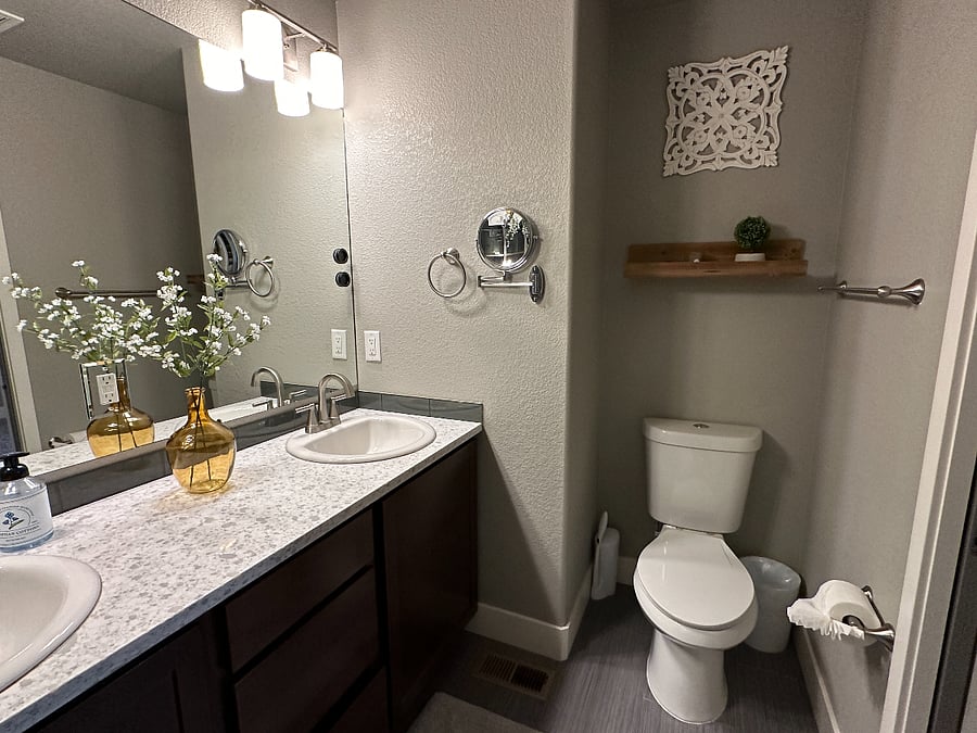 Primary bedroom in-suit bathroom with his/hers sinks