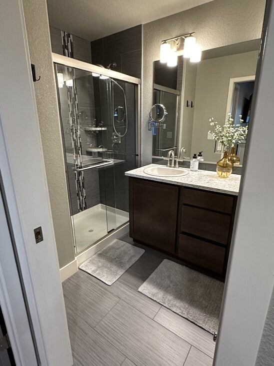 Primary bedroom in-suit bathroom with his/hers sinks