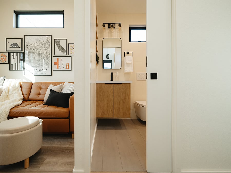 Private bathroom with locking pocket door.