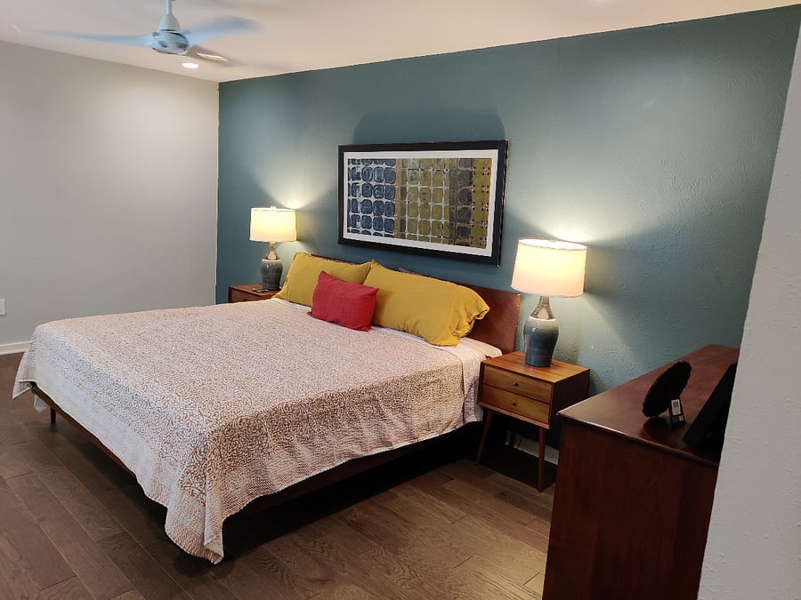 Large master bedroom with kingsize bed, your own dresser and large walk in closet.