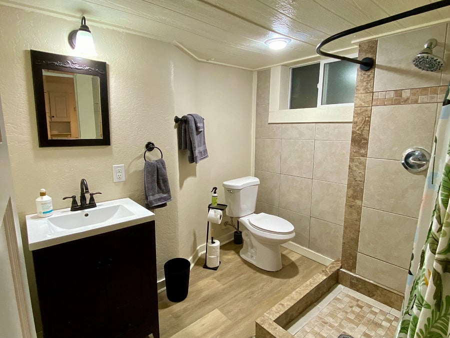Full sized bathroom stocked with the essentials