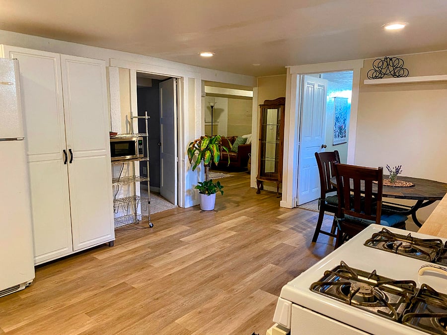 Kitchen with view of bedroom and office