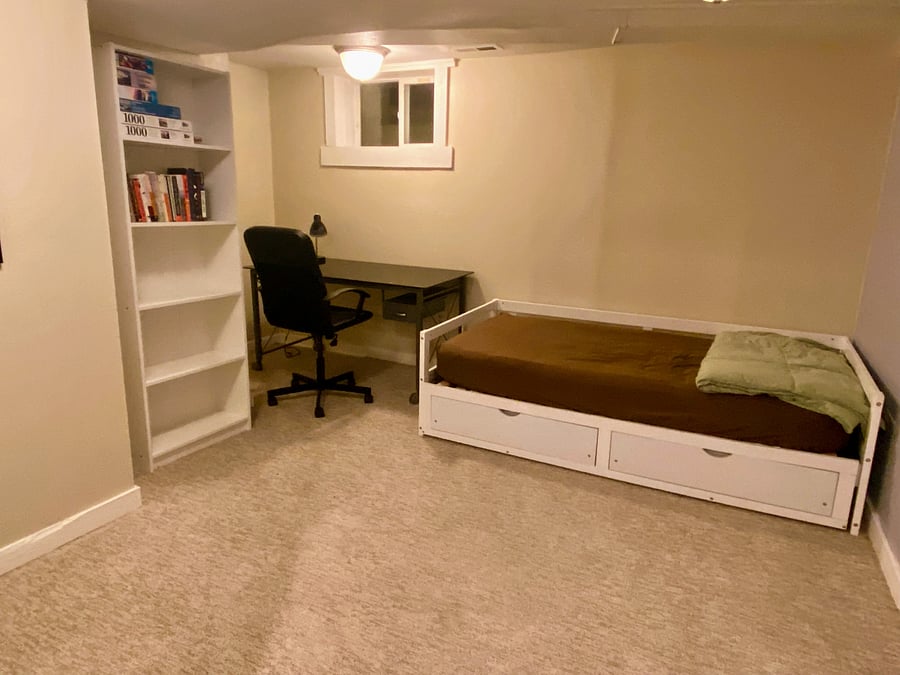 Second bedroom with desk and daybed. Mattress is twin sized, but frame can expand to queen sized
