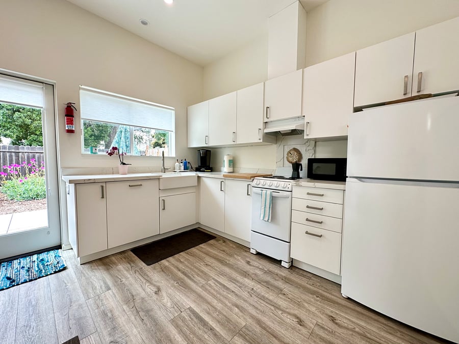 The kitchen is supplied with pots, pans, dishes, everything you need!