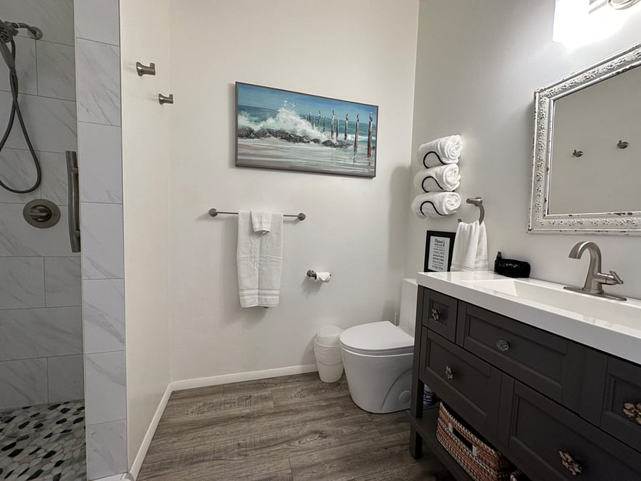 The private & luxurious bathroom has gobs of storage space!