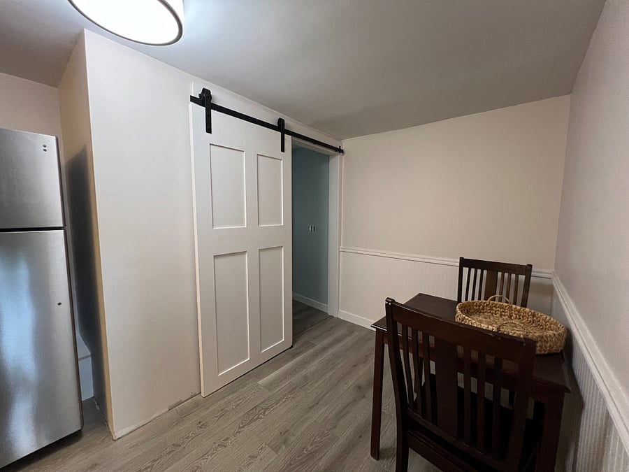 Kitchen has small table for 2.