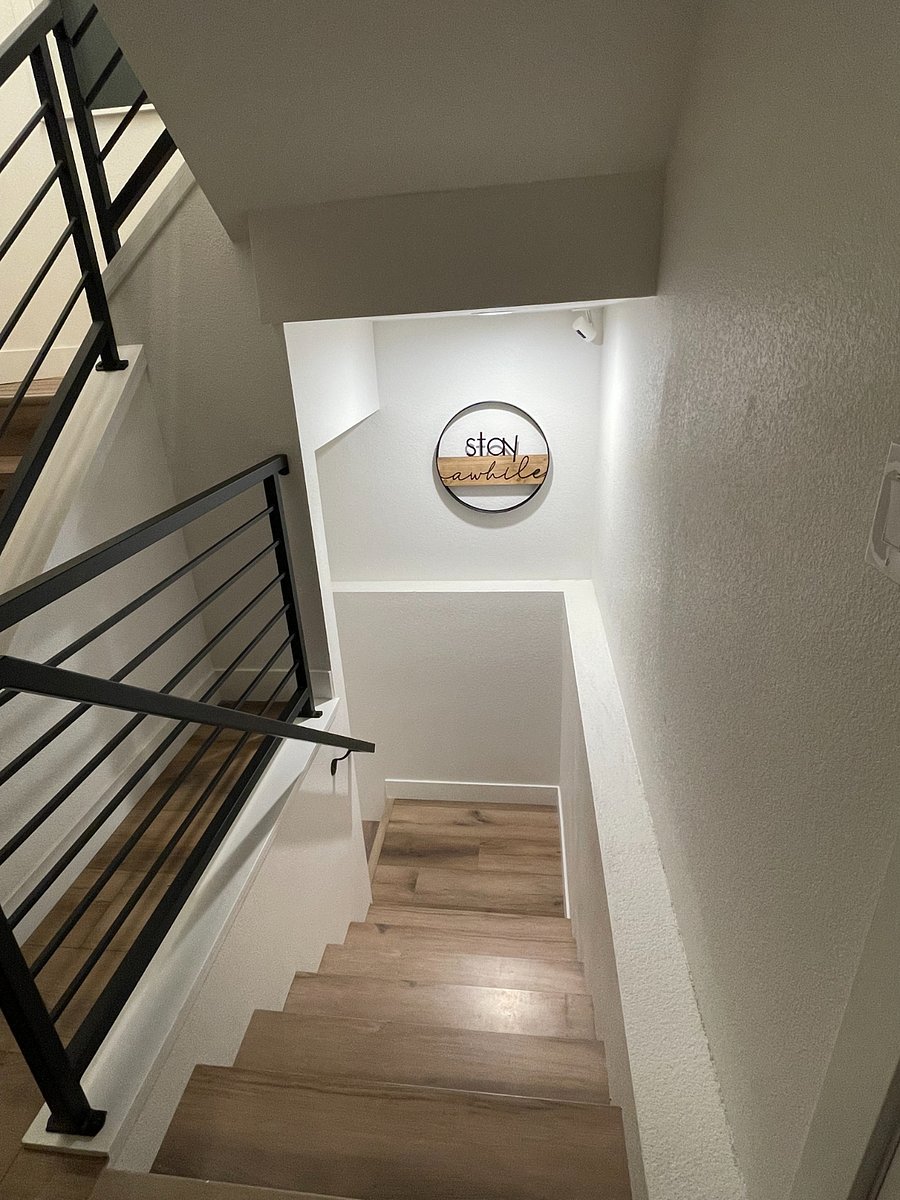 Staircase down to your private unit. You will have access to the camera facing your front door for added peace of mind.