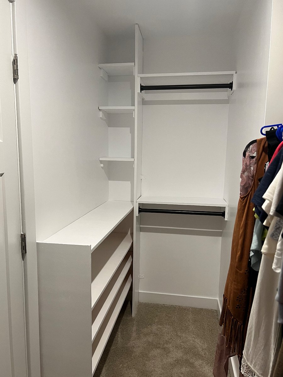 Master closet with boutique style shelving