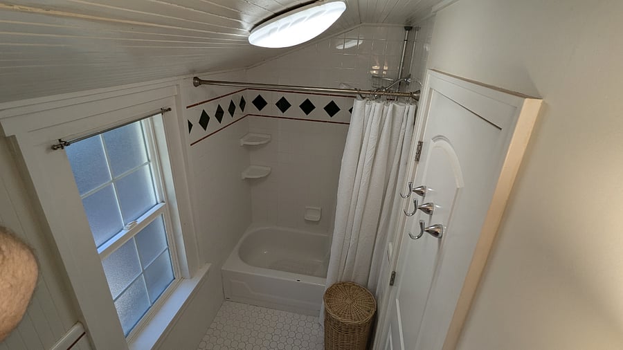 Bathroom with tub (fits 1 adult)