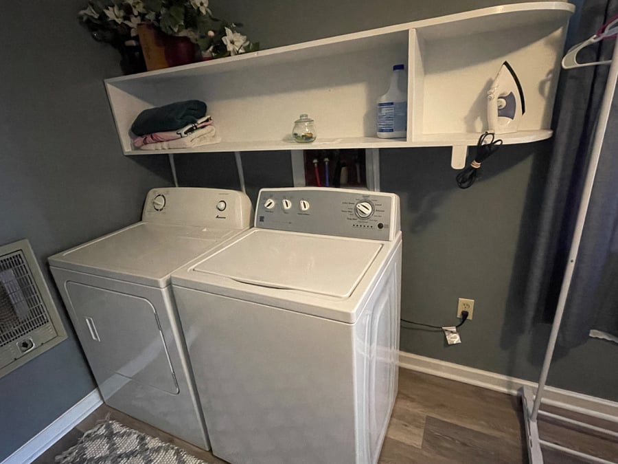 Washer & dryer for your use in a very long laundry room that can be used for some storage as well. Starter laundry supplies.
