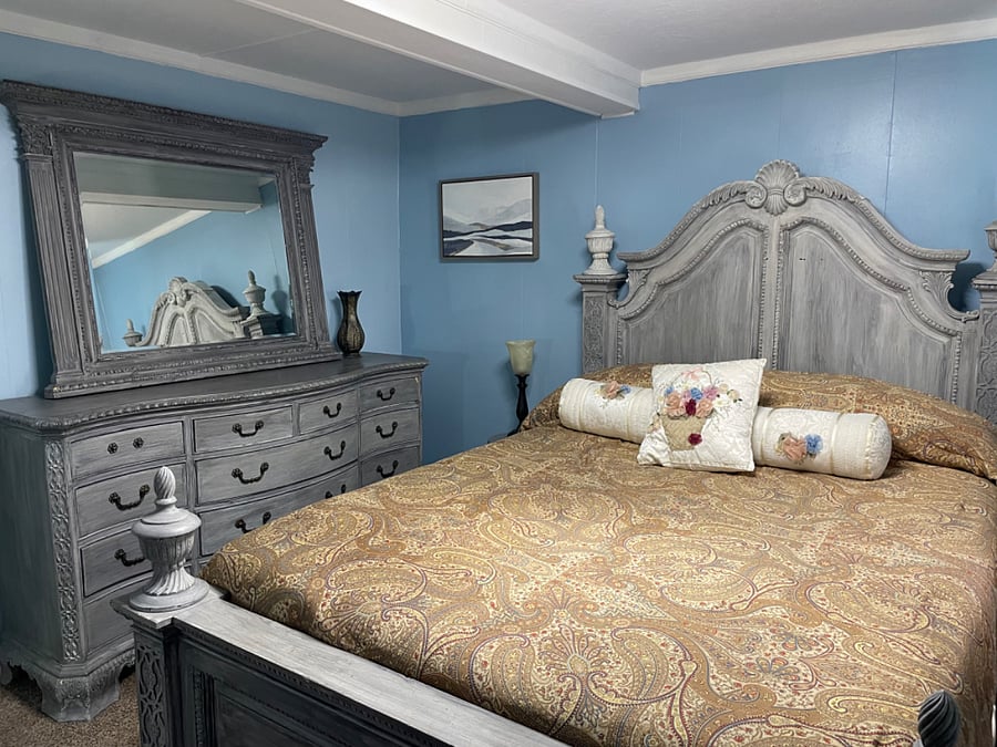 Queen bedroom with dresser, closet, luggage rack. Furniture set is circa 1970s and is so beautiful.