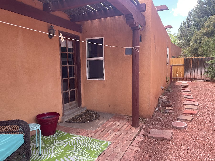 backyard patio and private entrance to unit
