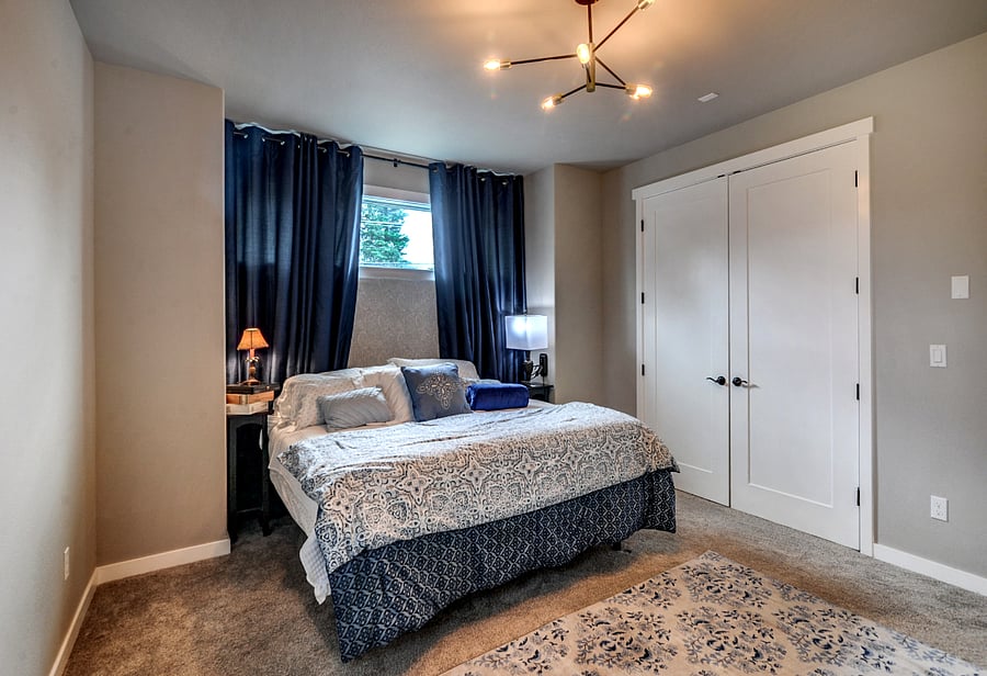 King bed with private bathroom on main floor.
