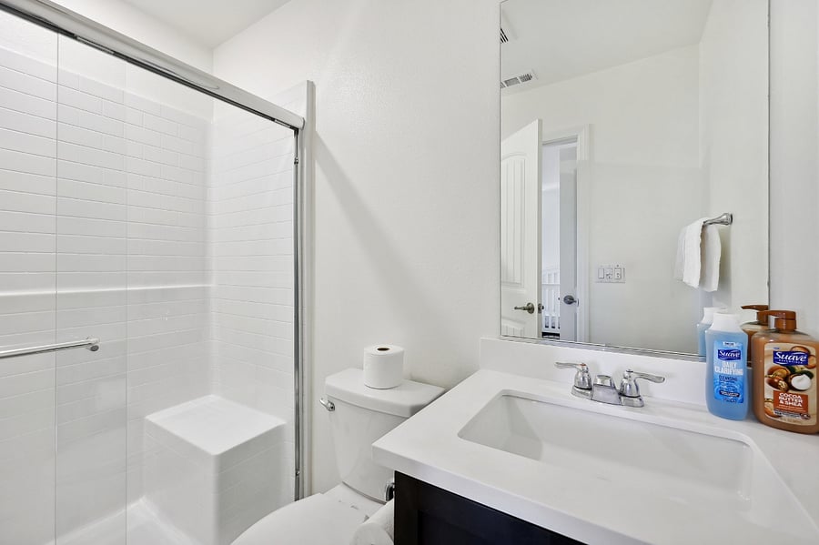 All-inclusive bliss: a full bathroom that makes every moment feel indulgent.