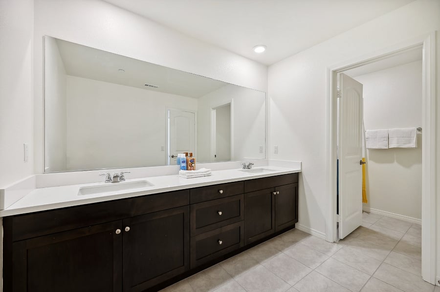 Twice the luxury: enjoy the convenience of dual sinks in your bathroom oasis.